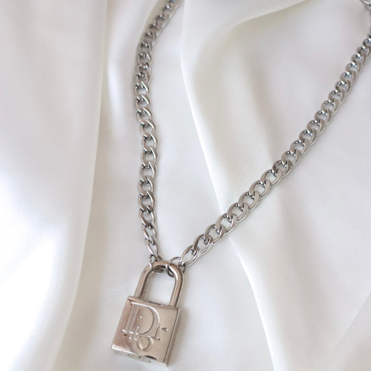 silver louis vuitton lock necklace
